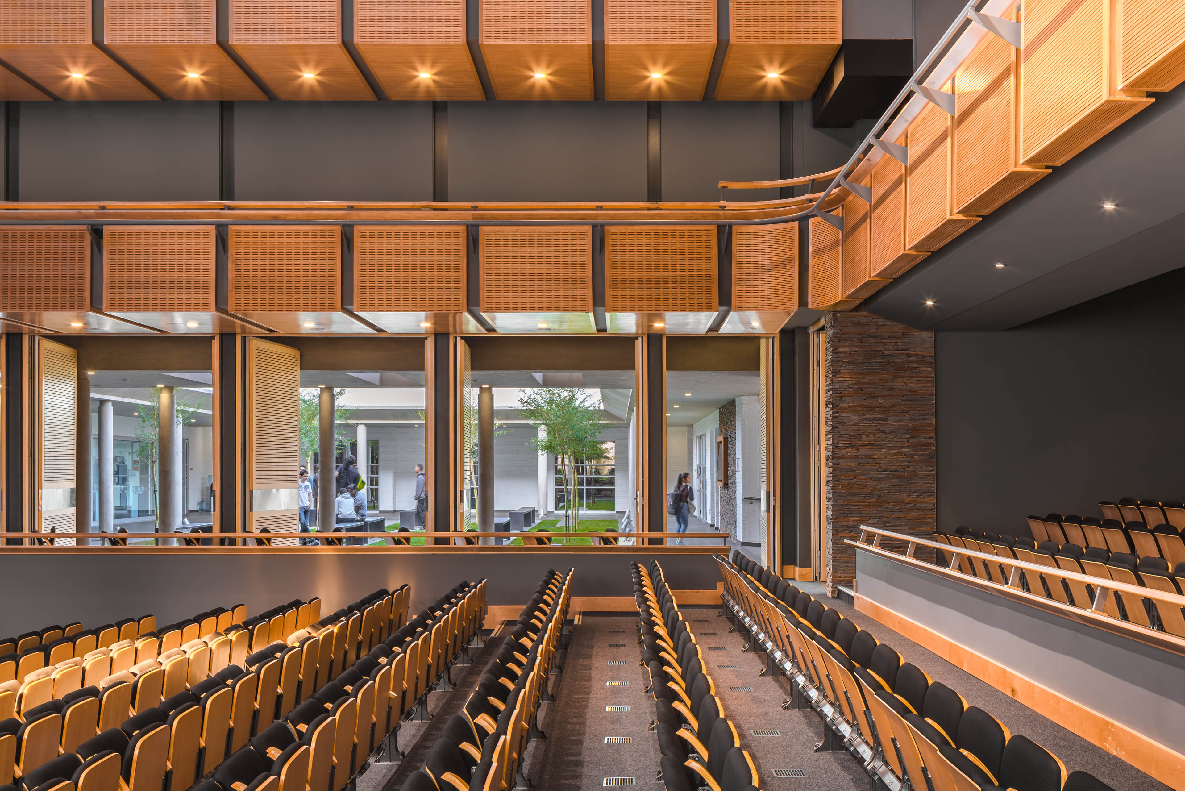 View of seats in vertical rows looking out to courtyard