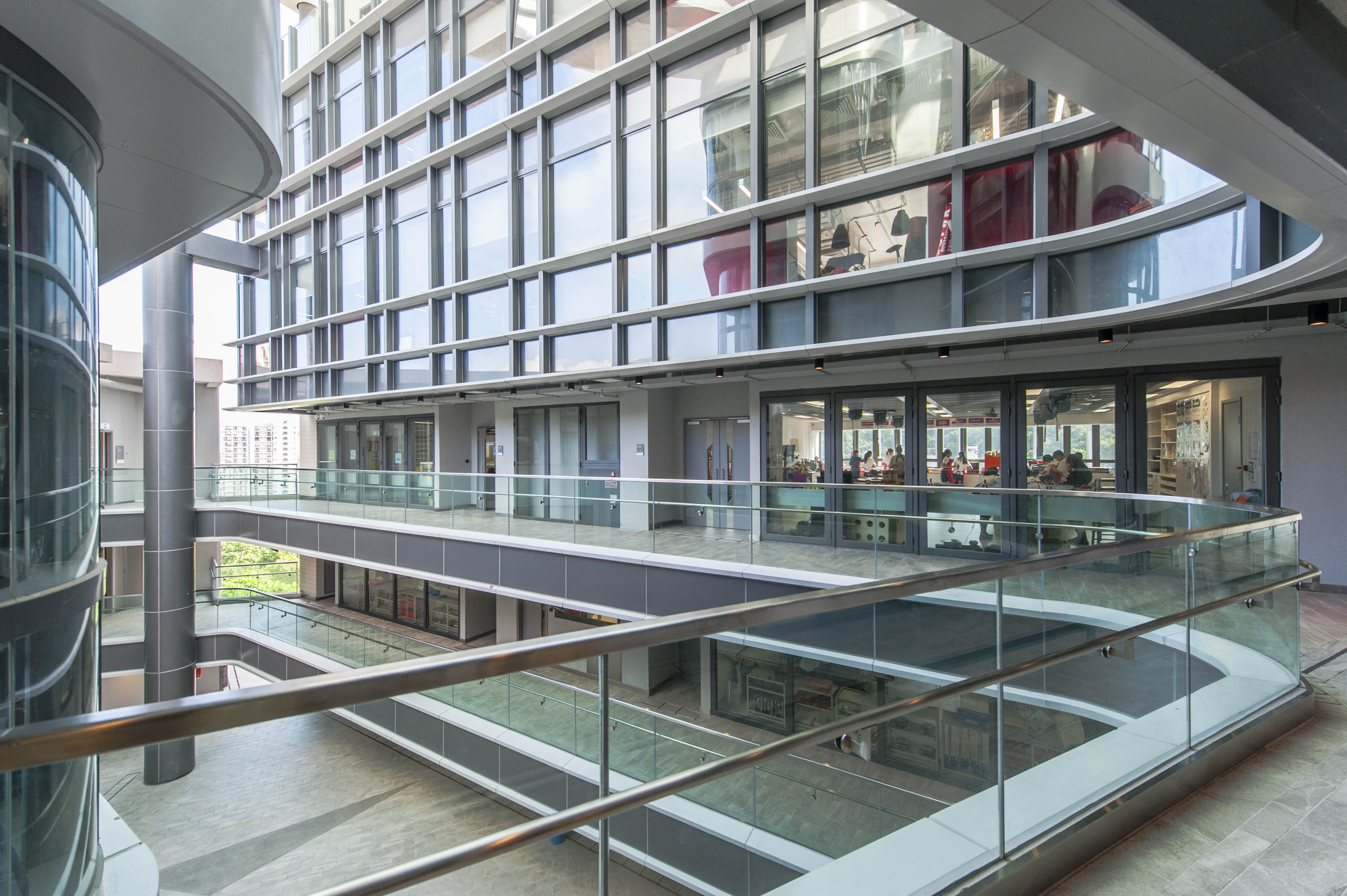 View of classroom with large windows from balcony 