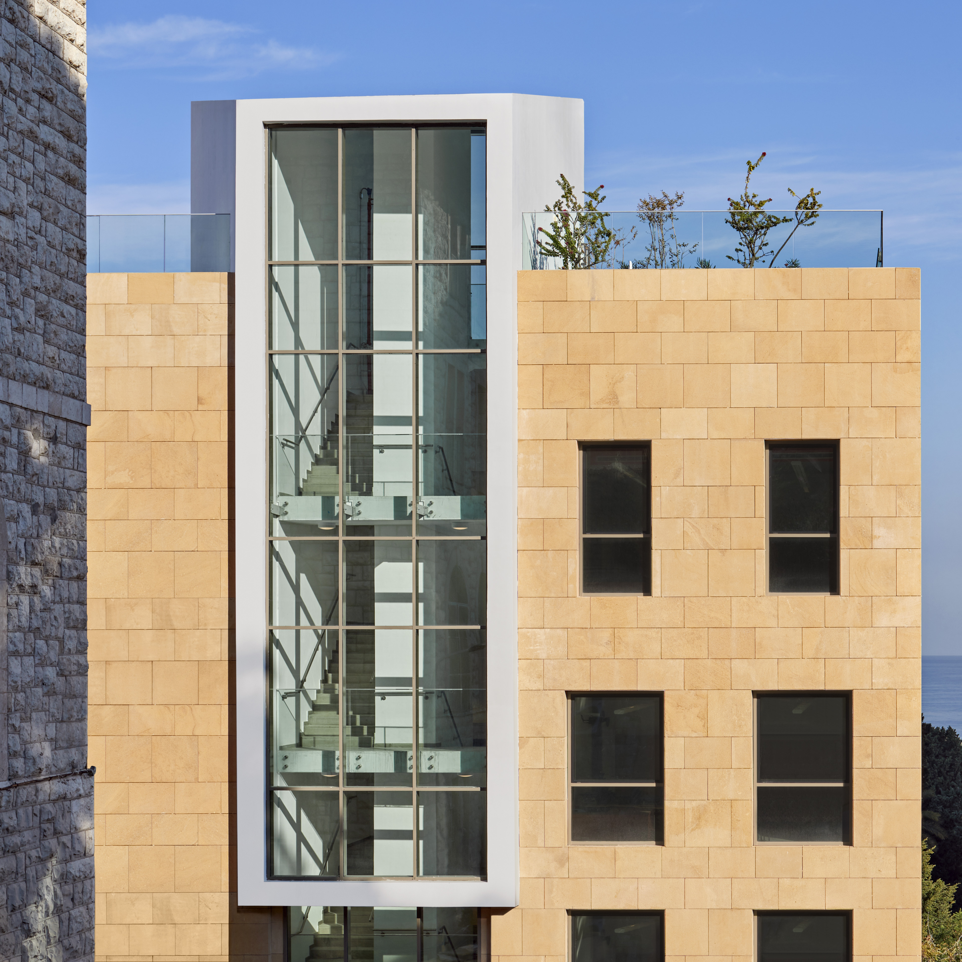 View of staircase window section with blue sky in background