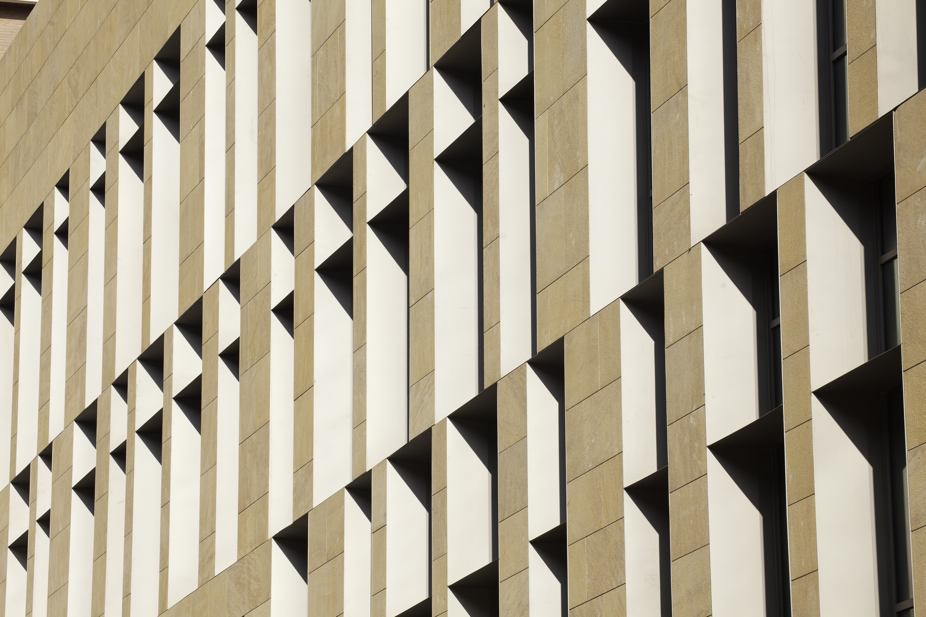 View of geometric pattern created from windows on exterior 